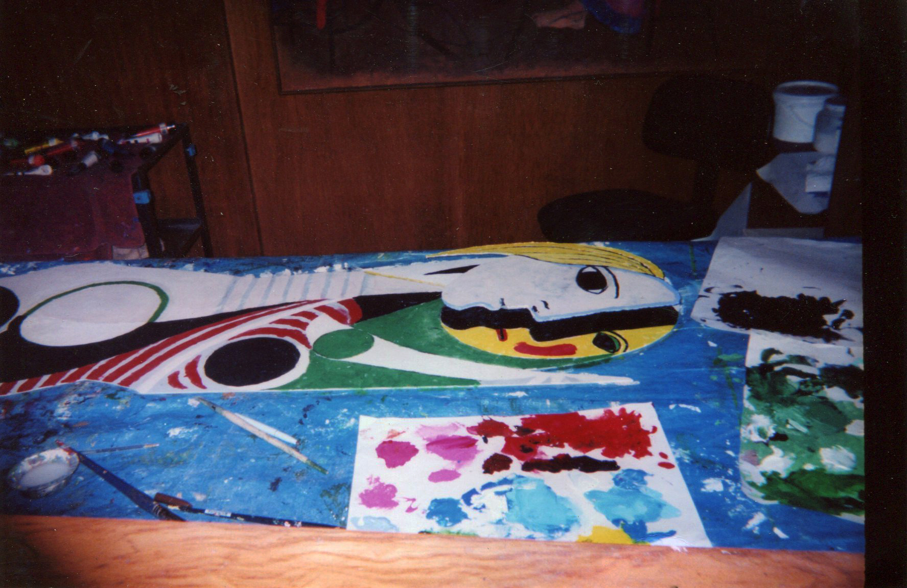 20b. Painting a sculpture.